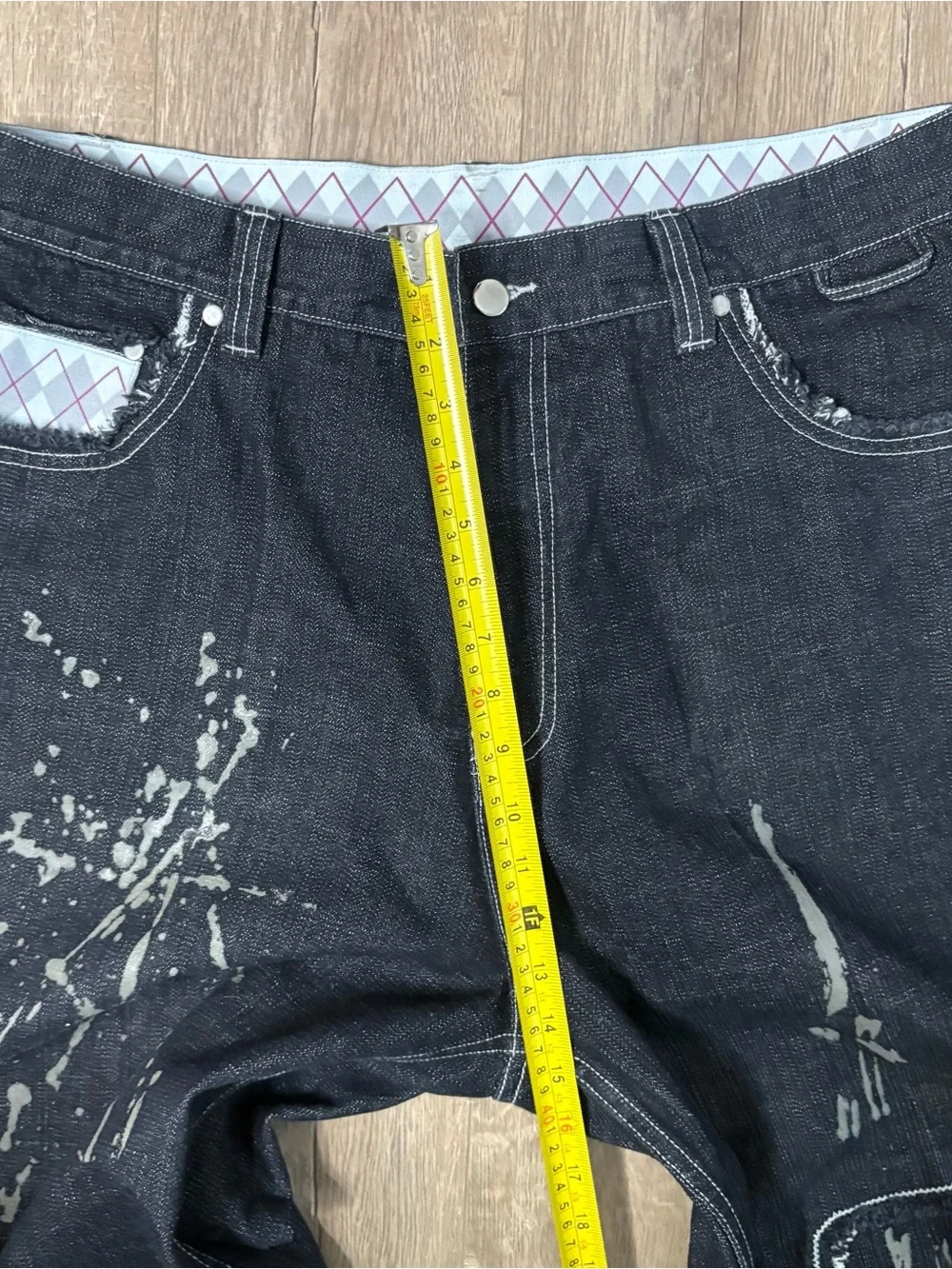 These wide-leg black jeans with white paint splatters Size 36x28